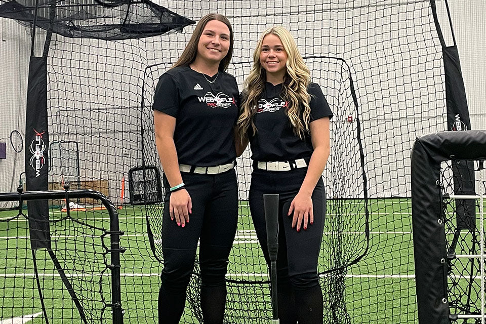 Goose Hutchens and Zoie Griffin standing in front of a Web Flex Spider Series Sock Net Screen