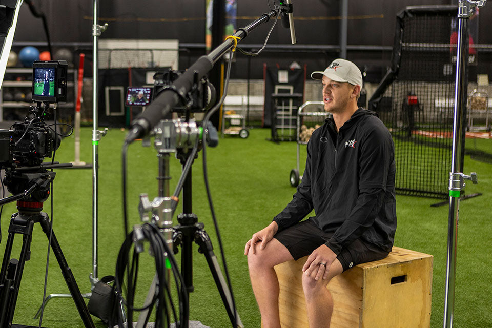 Parker Bridwell in front of camera equipment