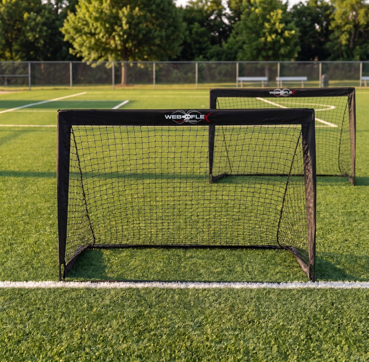 Web Flex 4x3 portable soccer goals set up as a pair on a grass field