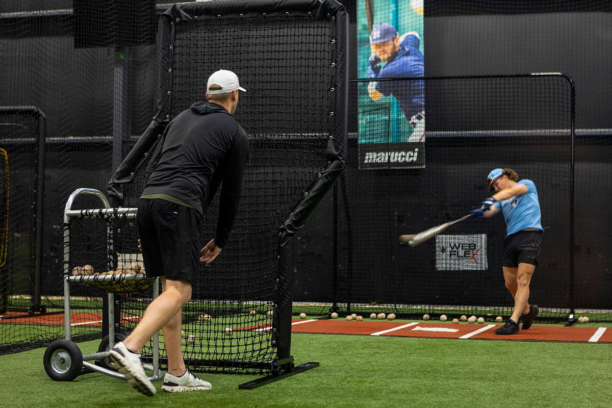 Parker Bridwell, pitching behind a Web Flex Pro Series Z-Screen.